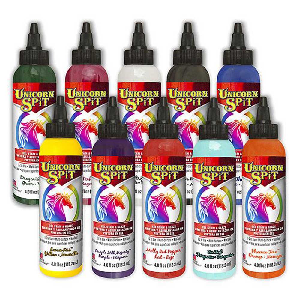 10 bottle of unicorn spits paint on a white background