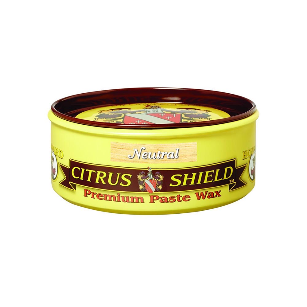 Yellow container of Citrus Shield Premium Paste Wax on a white background