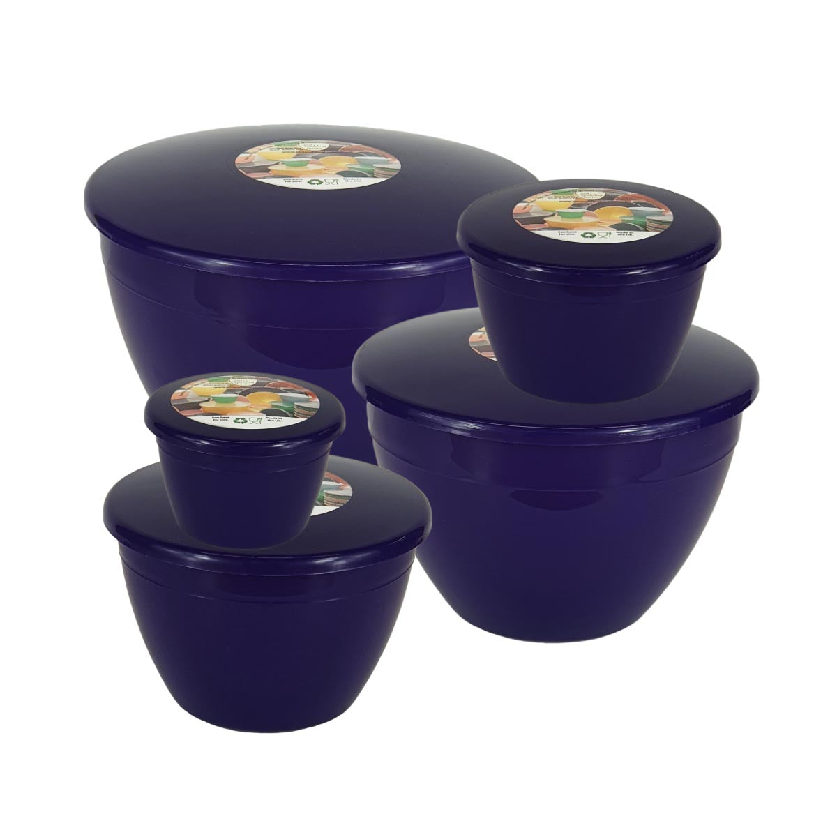 Set of five purple steam pudding bowls with lids on a white background