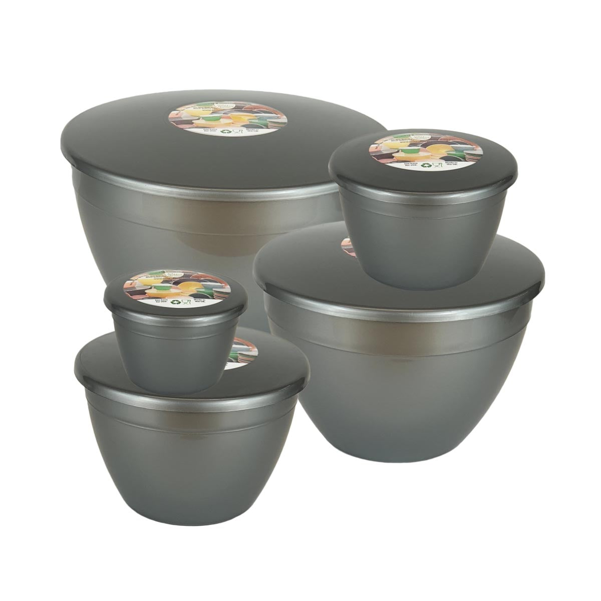 Set of silver coloured plastic steam pudding basins with lids on a white background