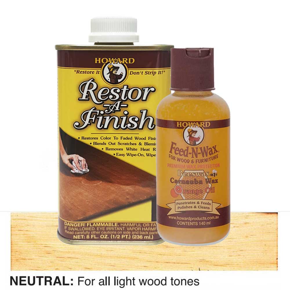 bottles of Howard Restor-A-Finish and Feed-N-Wax on a wooden surface.