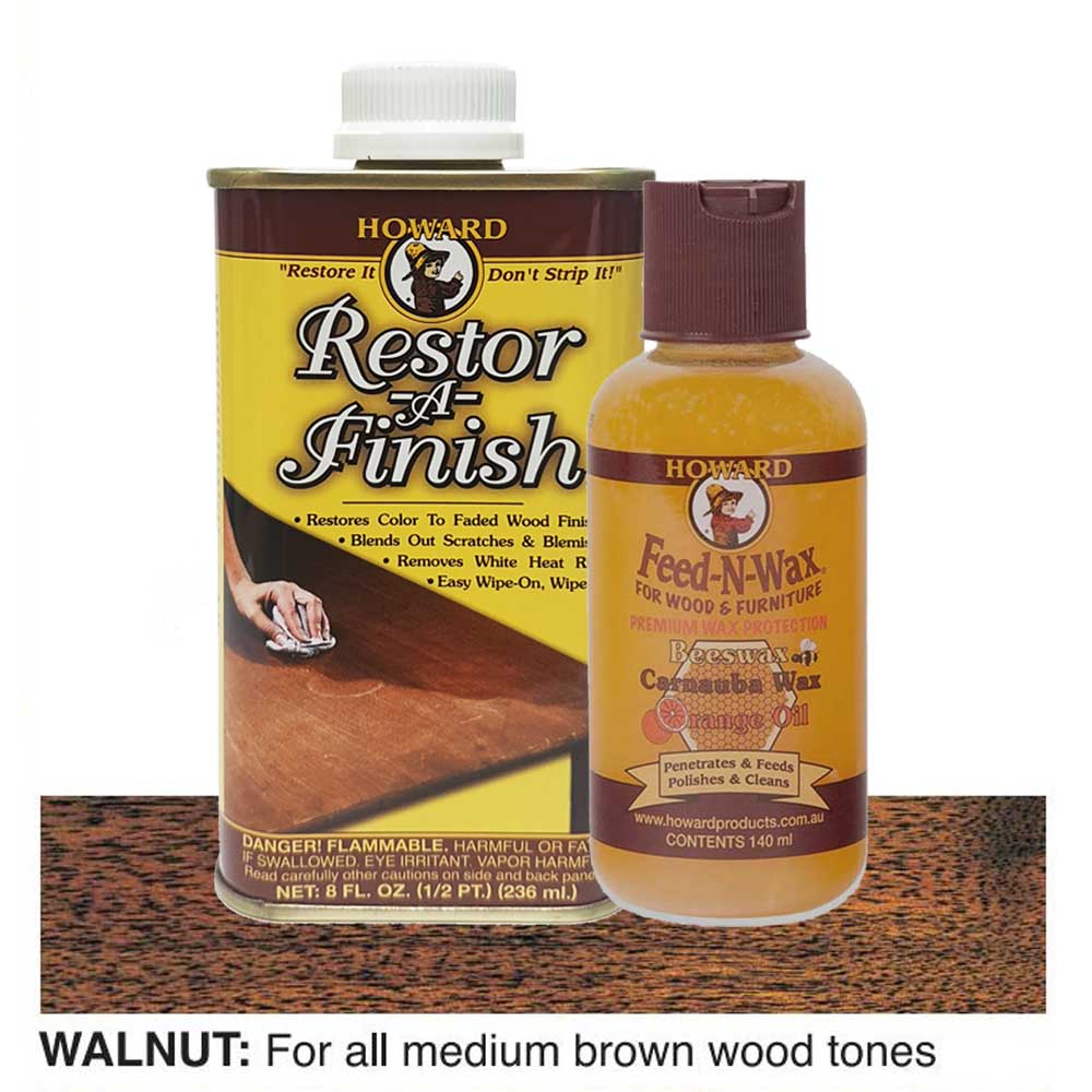 bottles of Howard Restor-A-Finish and Feed-N-Wax on a walnut wooden surface.