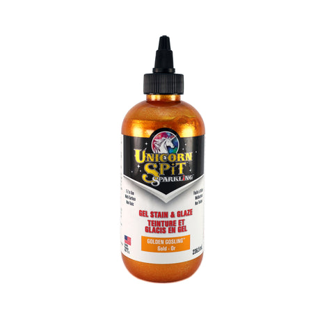 A bottle of Sparkling Unicorn SPiT Gel Stain Paint in Gold.