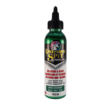 A bottle of Unicorn SPiT Sparkling Gel Stain in purple color with a label showing the brand and product name.