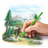 Hand holding a green pencil drawing a moose in a forest scene with trees and mountains.