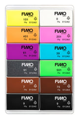 Set of FIMO modeling clay blocks in various colors on a white background