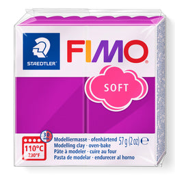 A package of Staedtler FIMO Purple Soft modeling clay, 57g (2 oz), featuring a white and magenta packaging design with the FIMO brand logo.