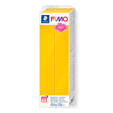A 454 g (1 lb) block of Fimo Soft sunflower yellow modelling clay in its original packaging against a plain white background.