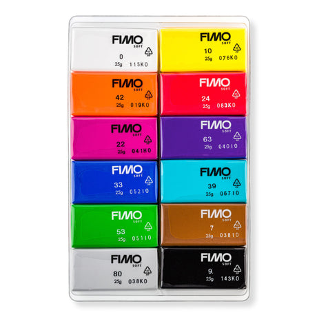 Set of FIMO modeling clay blocks in various colors on a white background