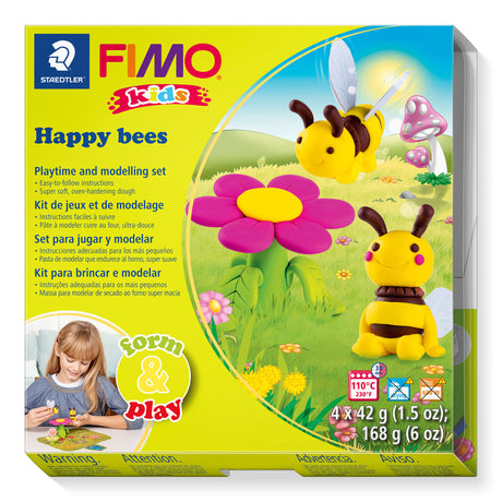 FIMO Kids Happy bees playtime and modelling set in its original retail packaging. The box features a bright lime green background with illustrations of two yellow and black bees, a pink and yellow flower, and a grassy field.