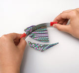 fimo polymer clay being cut with a flexible clay cutter