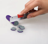 fimo polymer clay being cut into discs
