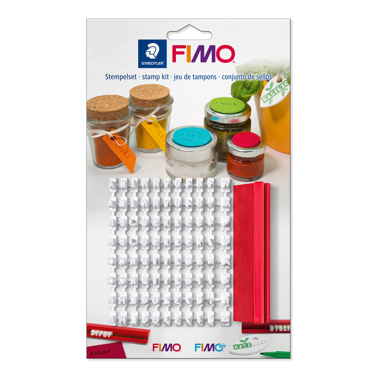 FIMO stamp kit packaging with jars and stamps on a white background