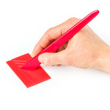 fimo polyclay modelling tool making indents into clay on a white background