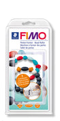 FIMO bead roller packaging with colorful beads on a white background