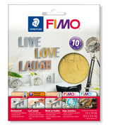 FIMO Stredtler 10-piece metallic leaf metal in gold, shown in its retail packaging with instructions and product examples.