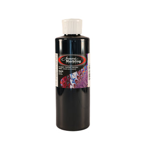 A bottle of Jacquard Marbling Floating Paint black
