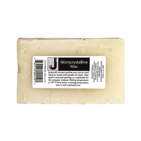 Block of  Jacquard microcrystalline wax with a label on a white background