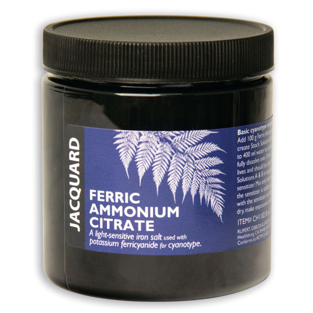 Ferric Ammonium Citrate jar with a blue label featuring fern graphics and text, on a white background