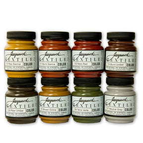 8 jars of Jacquard textile color fabric paints in earth tones on a white background