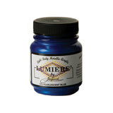 Blue acrylic paint jar with black lid on a white background