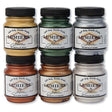 6 Jars of Jacquard Lumiere Metallic Fabric paints on a white background