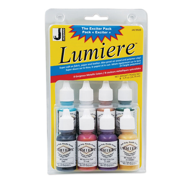 Jacquard Lumiere Exciter Pack containing 8 miniature metallic acrylic paint bottles, packaged in a clear blister pack with a yellow and blue cardboard backing.