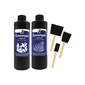 Two bottles of Cyanotype solution with foam brushes on a white background