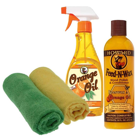 Orange Oil spray bottle, Feed-N-Wax wood polish, and cloths on a white background