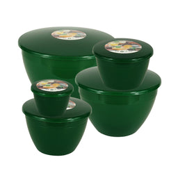 Set of emerald green pudding basins / bowls with lids on a white background
