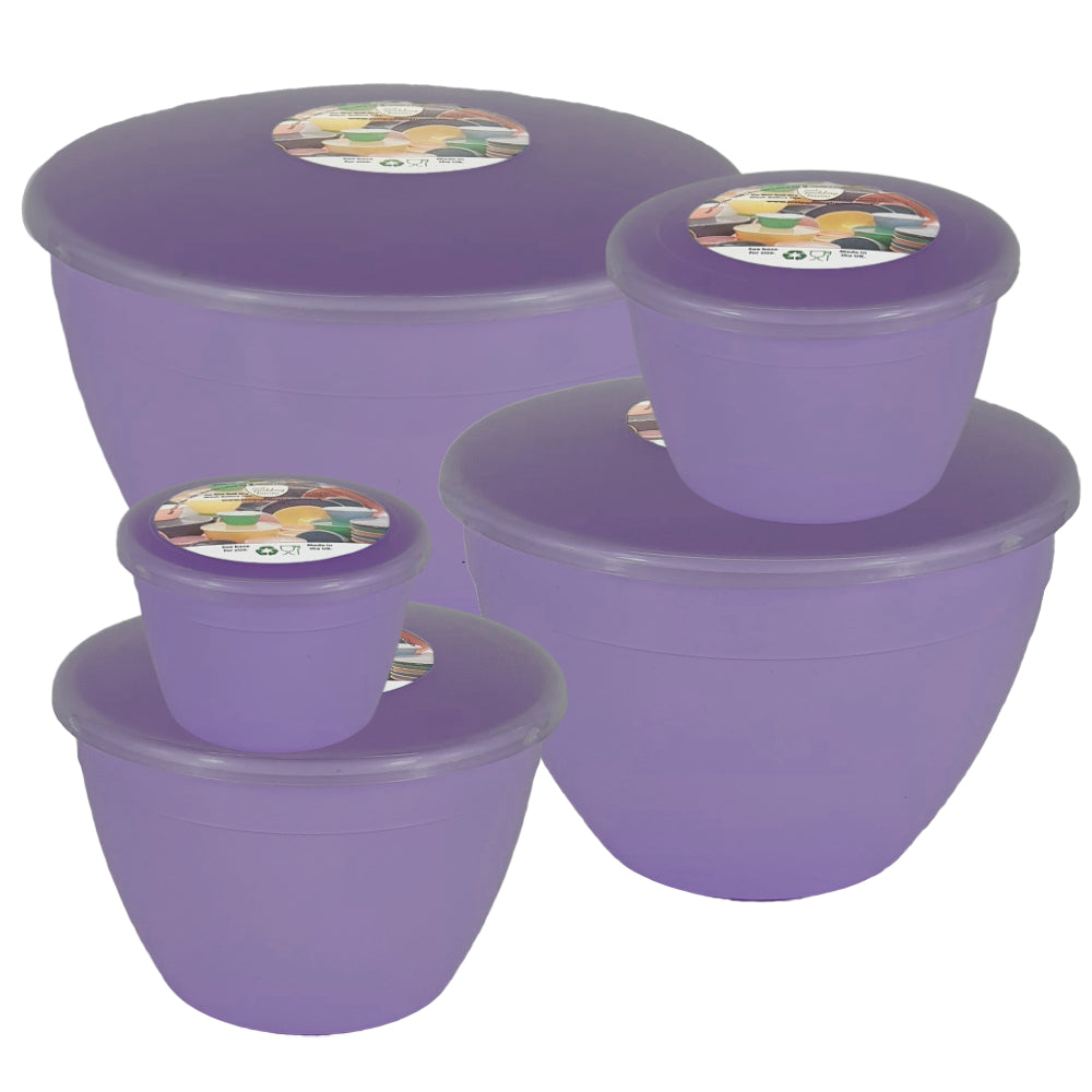 Set of purple plastic steamed pudding basins with lids on a white background