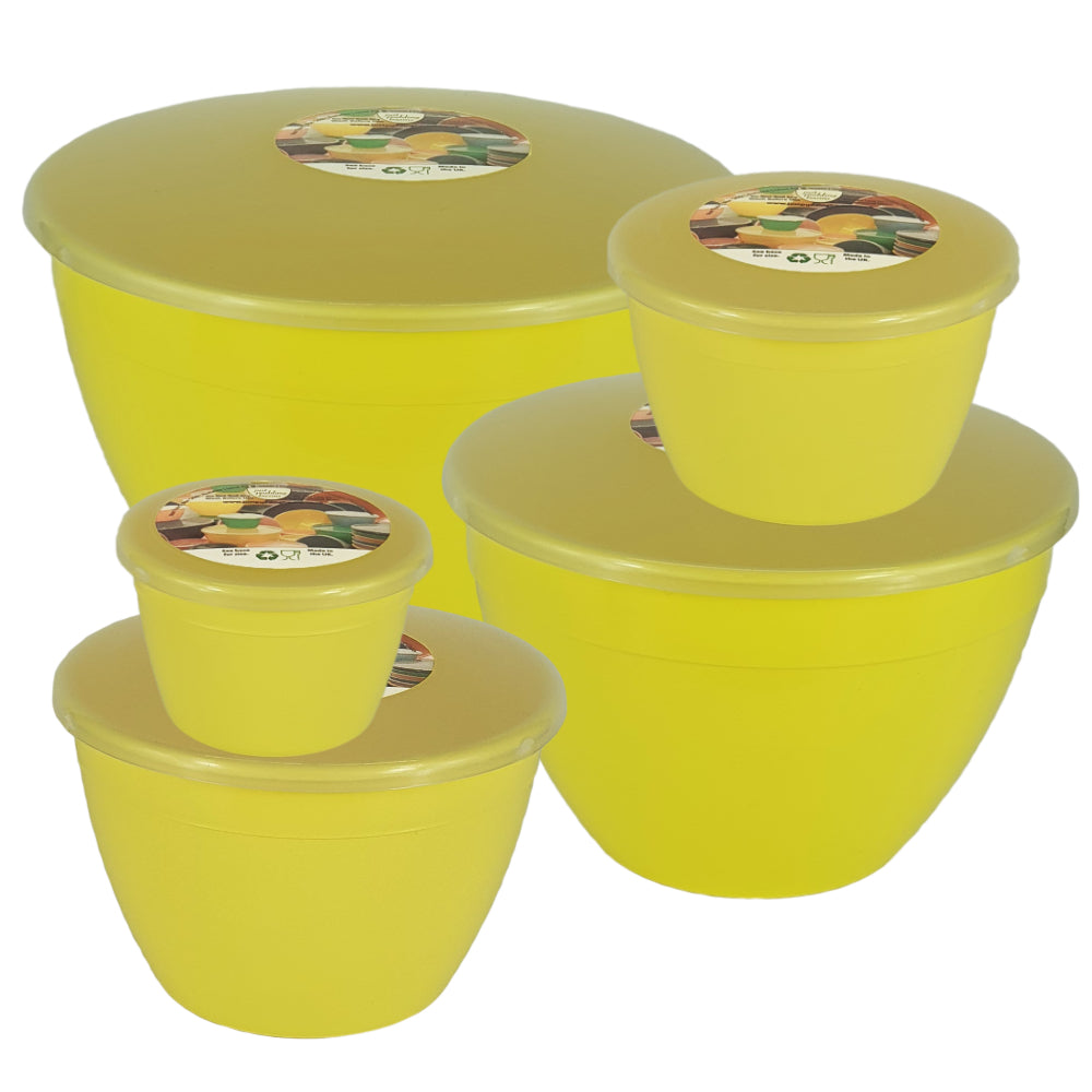 Set of yellow plastic containers with lids on a white background