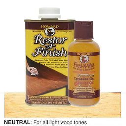 bottles of Howard Restor-A-Finish and Feed-N-Wax on a wooden surface.