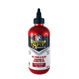 A bottle of Sparkling Unicorn SPiT Gel Stain Paint in Red.