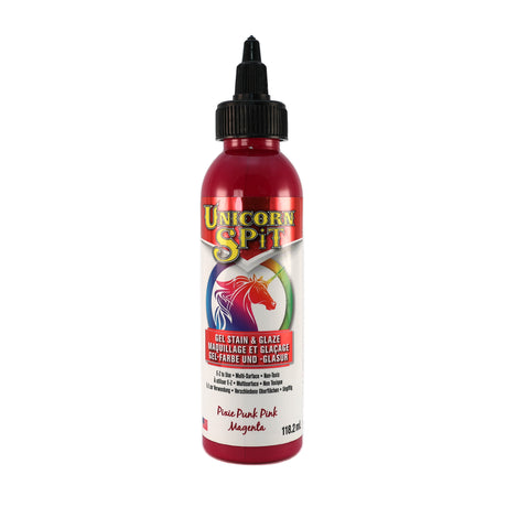 A bottle of Unicorn SPiT High Pigment Art Paint in Magenta.