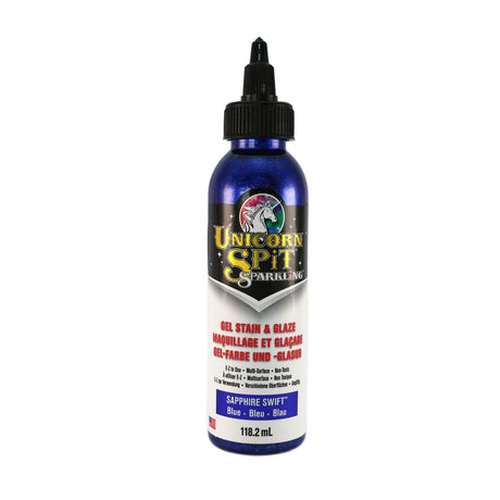 A bottle of Unicorn SPiT Sparkling Gel Stain in purple color with a label showing the brand and product name.