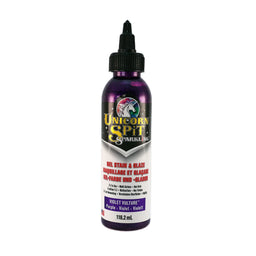 A bottle of Unicorn SPiT Sparkling Gel Stain in purple color with a label showing the brand and product name.
