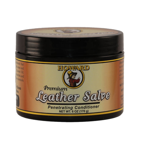 A jar of Howard Premium Leather Salve with the brand logo and product information printed on the label.