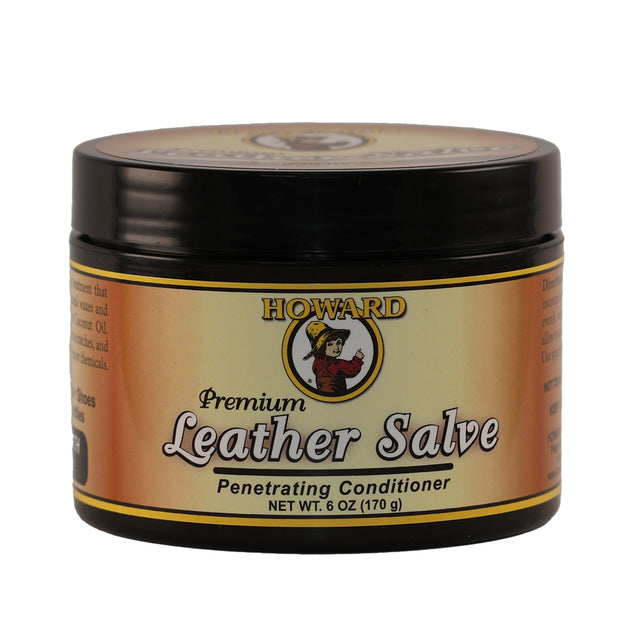 A jar of Howard Premium Leather Salve with the brand logo and product information printed on the label.