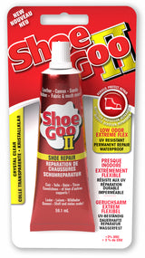 A tube of Shoe Goo II clear shoe glue with packaging displaying product information and usage instructions.