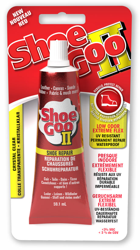 A tube of Shoe Goo II clear shoe glue with packaging displaying product information and usage instructions.