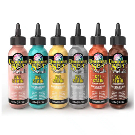 6 bottles of metallic unicorn spit paint on a white background