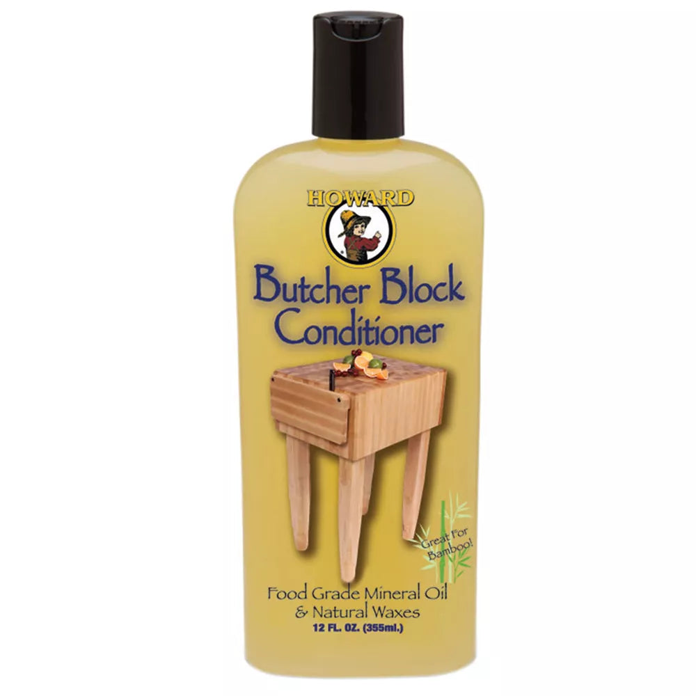 Butcher Block Conditioner bottle with a wooden block on a white background