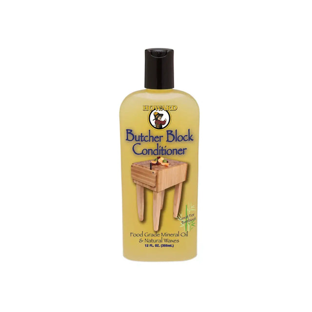 Butcher block conditioner bottle with a wooden block on a white background