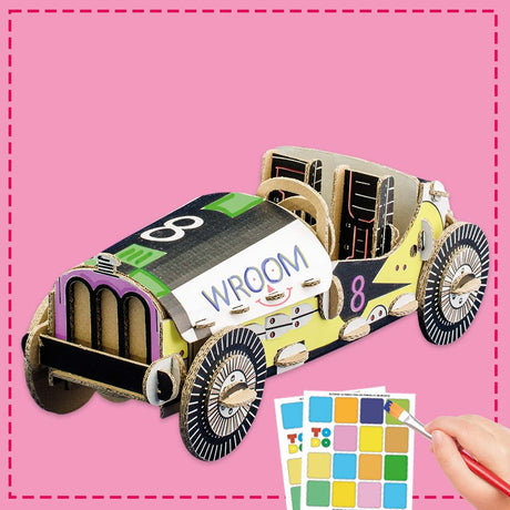 cardboard model of a car being painted