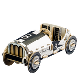 Model of a vintage race car with checkered pattern on a white background
