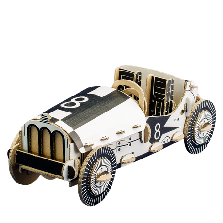 Model of a vintage race car with checkered pattern on a white background