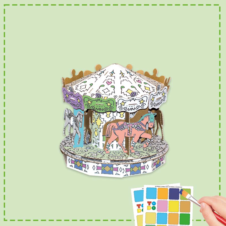 £d Cardboard Carousel puzzle being painted by a child
