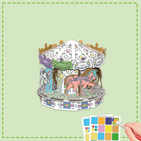 £d Cardboard Carousel puzzle being painted by a child