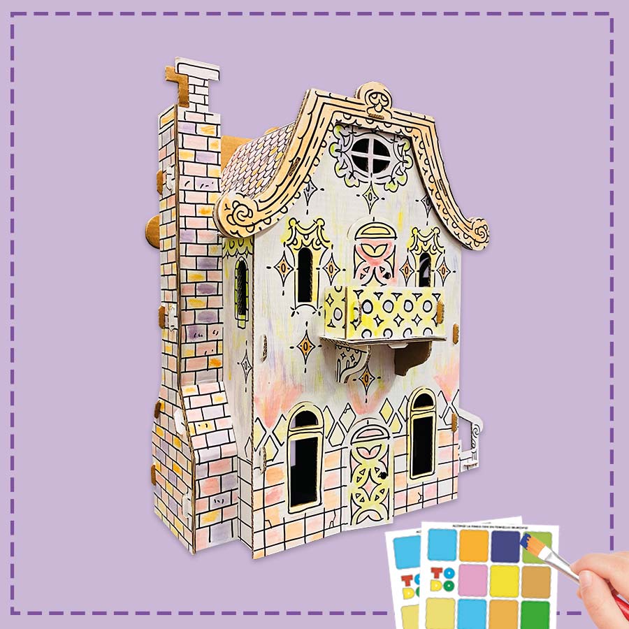 3d cardboard house being coloured in by a child
